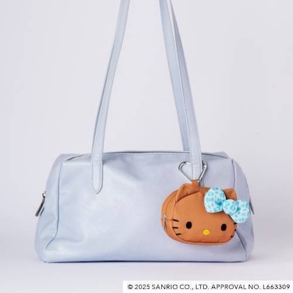 ひょう柄リボンが可愛い♡日焼けしたハローキティのポーチチャーム]